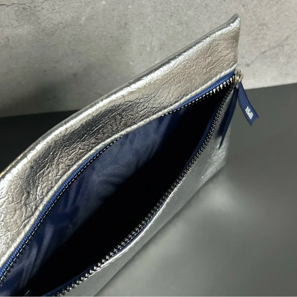 ipsy Silver Cosmetic Bag with Blue Zipper